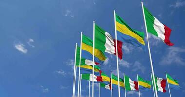 Gabon and Italy Flags Waving Together in the Sky, Seamless Loop in Wind, Space on Left Side for Design or Information, 3D Rendering video