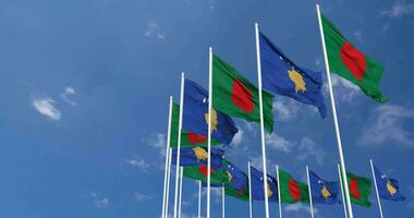 Kosovo and Bangladesh Flags Waving Together in the Sky, Seamless Loop in Wind, Space on Left Side for Design or Information, 3D Rendering video