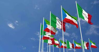 Equatorial Guinea and Italy Flags Waving Together in the Sky, Seamless Loop in Wind, Space on Left Side for Design or Information, 3D Rendering video