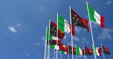 Papua New Guinea and Italy Flags Waving Together in the Sky, Seamless Loop in Wind, Space on Left Side for Design or Information, 3D Rendering video