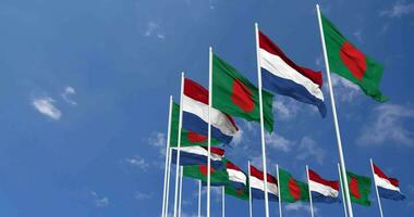 Netherlands and Bangladesh Flags Waving Together in the Sky, Seamless Loop in Wind, Space on Left Side for Design or Information, 3D Rendering video