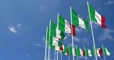 Nigeria and Italy Flags Waving Together in the Sky, Seamless Loop in Wind, Space on Left Side for Design or Information, 3D Rendering video