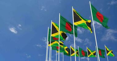 Jamaica and Bangladesh Flags Waving Together in the Sky, Seamless Loop in Wind, Space on Left Side for Design or Information, 3D Rendering video