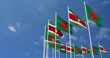 Suriname and Bangladesh Flags Waving Together in the Sky, Seamless Loop in Wind, Space on Left Side for Design or Information, 3D Rendering video