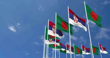 Serbia and Bangladesh Flags Waving Together in the Sky, Seamless Loop in Wind, Space on Left Side for Design or Information, 3D Rendering video