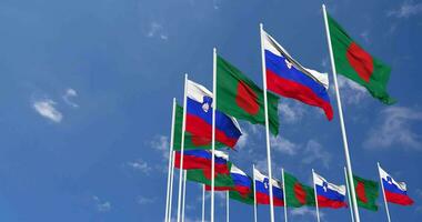 Slovenia and Bangladesh Flags Waving Together in the Sky, Seamless Loop in Wind, Space on Left Side for Design or Information, 3D Rendering video
