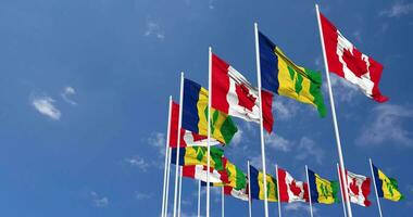 Saint Vincent and the Grenadines and Canada Flags Waving Together in the Sky, Seamless Loop in Wind, Space on Left Side for Design or Information, 3D Rendering video