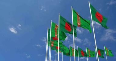 Turkmenistan and Bangladesh Flags Waving Together in the Sky, Seamless Loop in Wind, Space on Left Side for Design or Information, 3D Rendering video