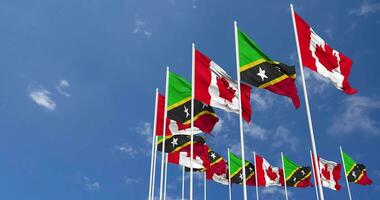 Saint Kitts and Nevis and Canada Flags Waving Together in the Sky, Seamless Loop in Wind, Space on Left Side for Design or Information, 3D Rendering video