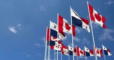 Panama and Canada Flags Waving Together in the Sky, Seamless Loop in Wind, Space on Left Side for Design or Information, 3D Rendering video