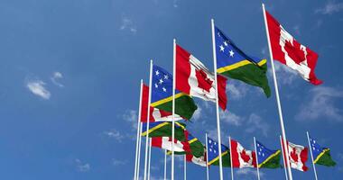 Solomon Islands and Canada Flags Waving Together in the Sky, Seamless Loop in Wind, Space on Left Side for Design or Information, 3D Rendering video