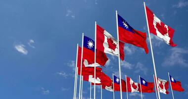 Taiwan e Canadá bandeiras acenando juntos dentro a céu, desatado ciclo dentro vento, espaço em esquerda lado para Projeto ou Informação, 3d Renderização video