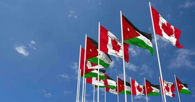 Jordan and Canada Flags Waving Together in the Sky, Seamless Loop in Wind, Space on Left Side for Design or Information, 3D Rendering video