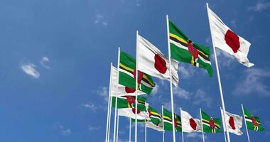 Dominica and Japan Flags Waving Together in the Sky, Seamless Loop in Wind, Space on Left Side for Design or Information, 3D Rendering video