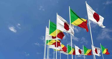 Congo e Japão bandeiras acenando juntos dentro a céu, desatado ciclo dentro vento, espaço em esquerda lado para Projeto ou Informação, 3d Renderização video