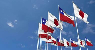 Chile and Japan Flags Waving Together in the Sky, Seamless Loop in Wind, Space on Left Side for Design or Information, 3D Rendering video