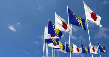 Bosnia and Herzegovina and Japan Flags Waving Together in the Sky, Seamless Loop in Wind, Space on Left Side for Design or Information, 3D Rendering video