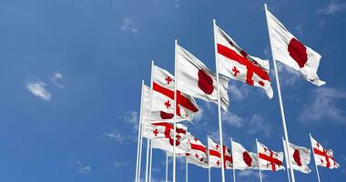 Georgia and Japan Flags Waving Together in the Sky, Seamless Loop in Wind, Space on Left Side for Design or Information, 3D Rendering video