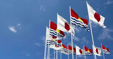 Kiribati and Japan Flags Waving Together in the Sky, Seamless Loop in Wind, Space on Left Side for Design or Information, 3D Rendering video