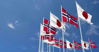 Norway and Japan Flags Waving Together in the Sky, Seamless Loop in Wind, Space on Left Side for Design or Information, 3D Rendering video