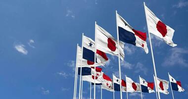 Panama and Japan Flags Waving Together in the Sky, Seamless Loop in Wind, Space on Left Side for Design or Information, 3D Rendering video