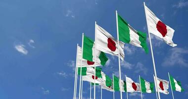 Nigeria and Japan Flags Waving Together in the Sky, Seamless Loop in Wind, Space on Left Side for Design or Information, 3D Rendering video