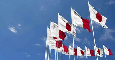 Malta and Japan Flags Waving Together in the Sky, Seamless Loop in Wind, Space on Left Side for Design or Information, 3D Rendering video