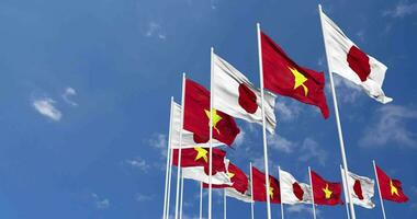 Vietnam and Japan Flags Waving Together in the Sky, Seamless Loop in Wind, Space on Left Side for Design or Information, 3D Rendering video