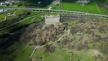 Aerial view of famous Ussel castle Aosta Valley Italy top down view video
