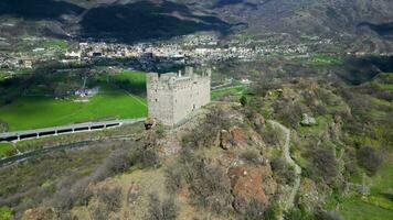 Side aerial view of beautiful Ussel castle Aosta valley Italy video