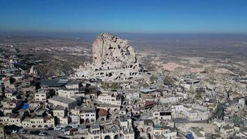 Aerial drone view of the Uchisar Castle in Cappadocia, Turkey. This tall volcanic-rock outcrop is one of Cappadocia's most prominent landmarks. video