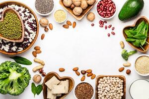 Sources of vegetable protein. Beans, nuts and other nutritious ingredients are framed. photo