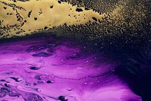 Fluid Art. Metallic gold abstraction on purple waves. Marble effect background or texture photo