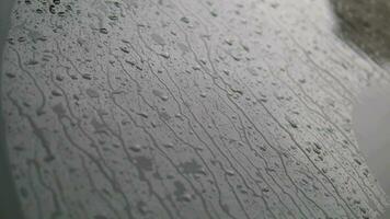 Rain drops on the car window , rainy day video