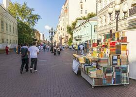Moscow, Russia - 07.24.2023 - People enjoying day out at famous Arbat street. City photo