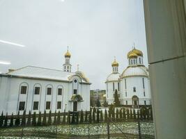 Shot of the domes of the old wooden orthodox church. Religion photo