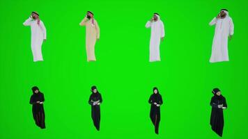 Arab women and men walking in the streets of Dubai and talking on the phone 3D video