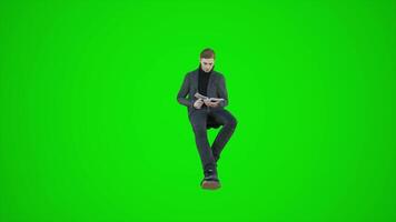 3d animatie van een mannetje auteur zittend Aan een groen scherm lezing een boek in chroma video