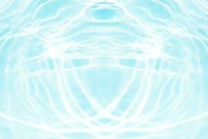 Bluewater waves on the surface ripples blurred. Defocus blurred transparent blue colored clear calm water surface texture with splash and bubbles. Water waves with shining pattern texture background. photo
