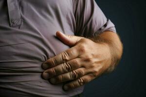 AI generated Obesity awareness a mans hand showcases excess belly fat photo