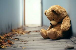 AI generated Lonely sorrow Childs teddy bear leans against wall, expressing sadness photo