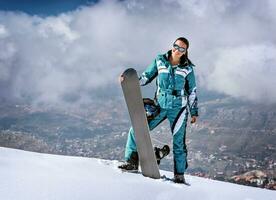 Snowboarding in the mountains photo