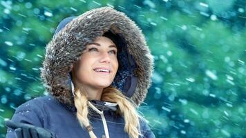 Happy woman in winter park photo