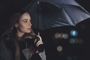 Beautiful woman under the rain photo