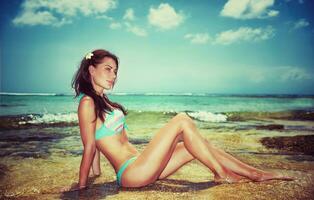 Beautiful model on the beach photo