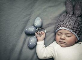 Newborn baby dressed for Easter photo