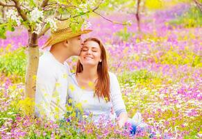 Happy lovers kissing outdoors photo