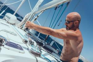 Experienced and strong Captain on solo sail photo