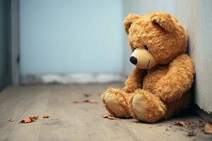 AI generated Lonely sorrow Childs teddy bear leans against wall, expressing sadness photo