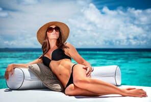 Sexy woman on the beach photo